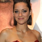 Actress Marion Cotillard attends the 'Public Enemies' film premiere at the Empire Leicester Square on June 29, 2009 in London, England.